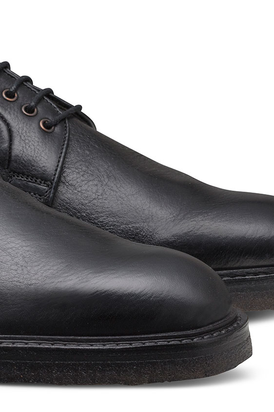 Черные дерби из кожи