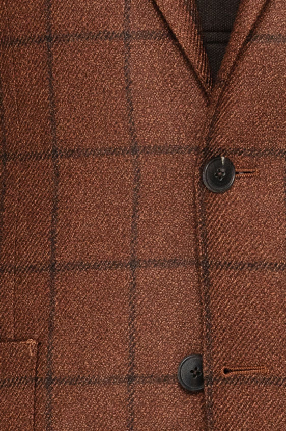 Коричневый пиджак в крупную темную клетку