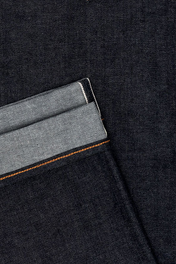 Хлопковые темно-синие джинcы из сырого денима selvedge