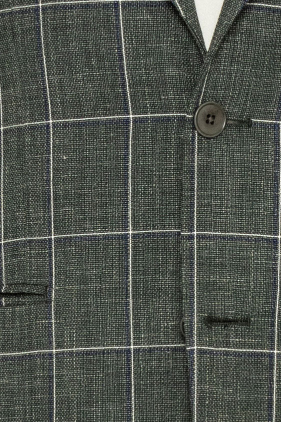 Зеленый костюм в крупную клетку