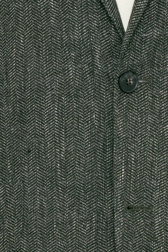 Темно-зеленый пиджак в елочку