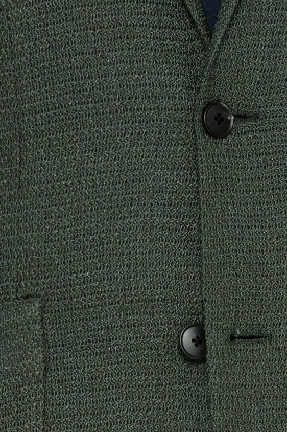 Зеленый пиджак вязаной фактуры
