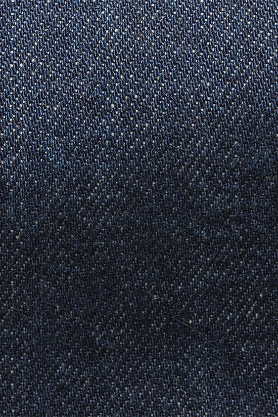 Джинсы темно-синего цвета из стираного денима