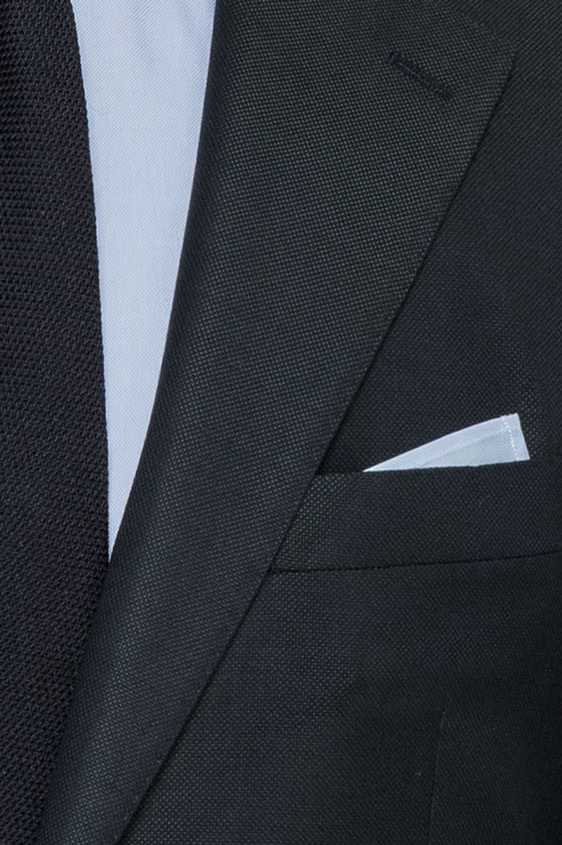 Темно-зеленый костюм из шерсти