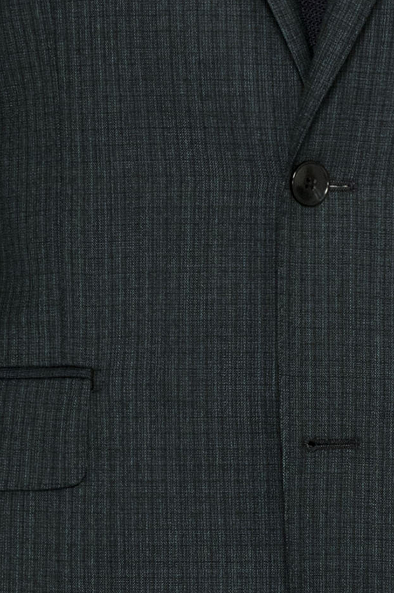 Темно-зеленый костюм из шерсти