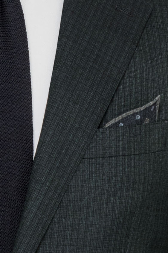 Темно-зеленый костюм из шерсти