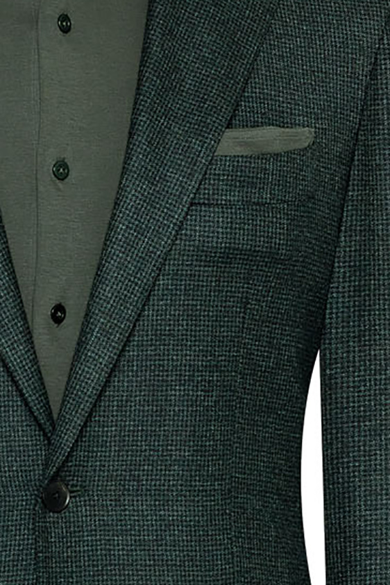 Темно-зеленый костюм из шерсти